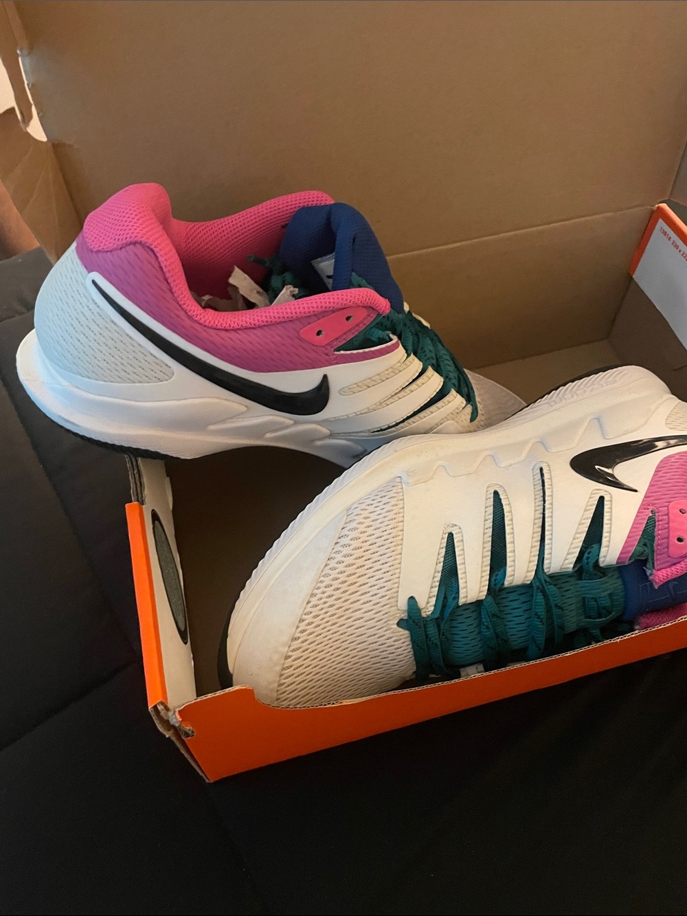 Nike White Athletic Sneakers with Pink Collar and Teal Laces